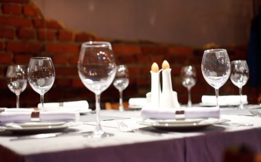 Tables set for meal clipart