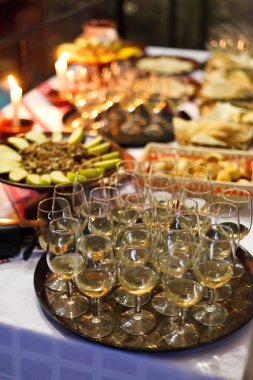 Serving champagne at a party clipart