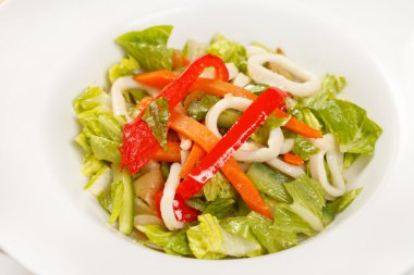 Vegetable salad with calamari