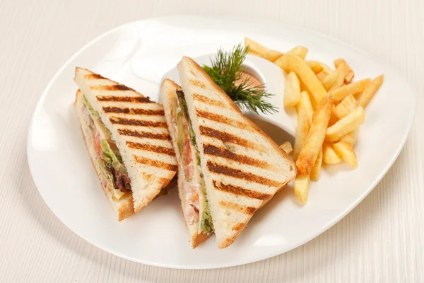 Sandwiches with French fried potatoes — Stock Photo, Image