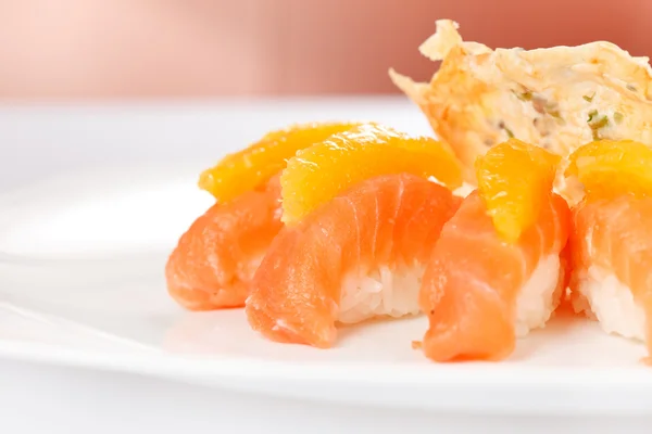 Salmon nigiri with orange — Stock Photo, Image