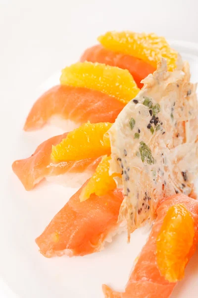 Salmon nigiri with orange — Stock Photo, Image