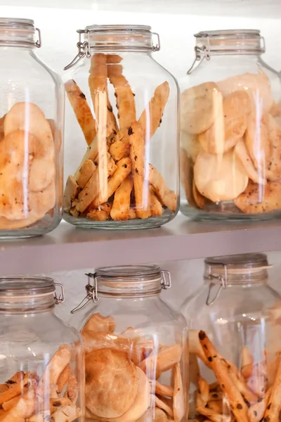 stock image Glass cookie jars in the coffee shop