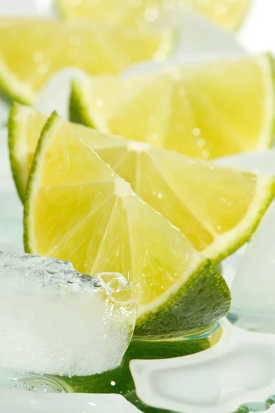 stock image Limes and ice cubes