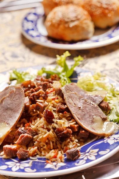 Uzbek national dish - plov with horse meat — Stock Photo, Image