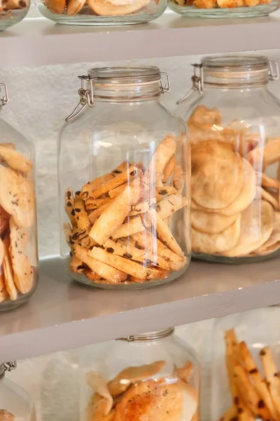 stock image Glass cookie jars in the coffee shop