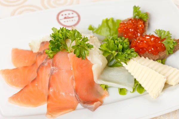 Appetizer with smoked salmon — Stock Photo, Image