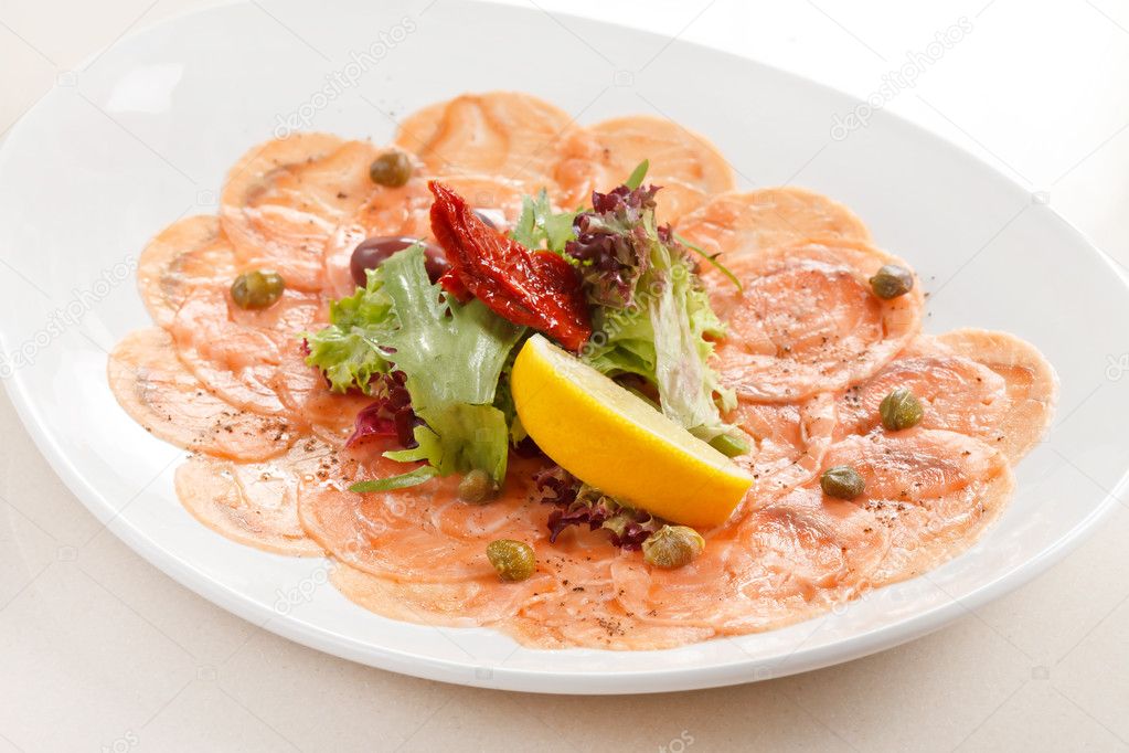 Fish Carpaccio with salad