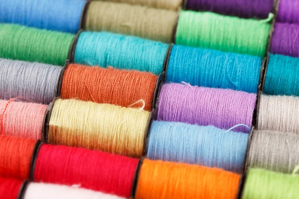 Bobbins of lurex thread — Stock Photo, Image