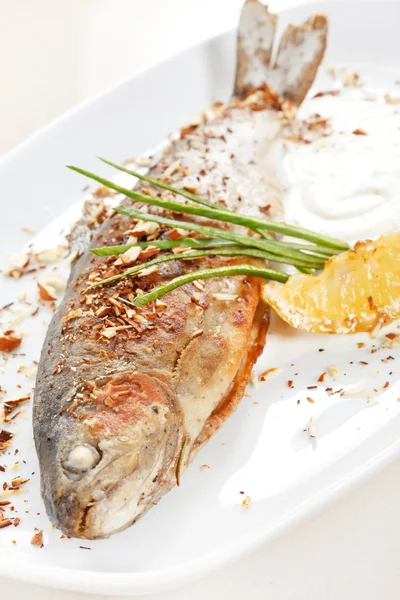 Trout fish baked with nuts — Stock Photo, Image