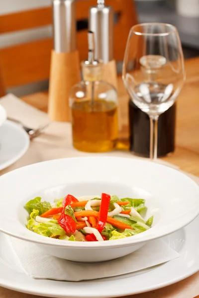 Vegetable salad with calamari — Stock Photo, Image