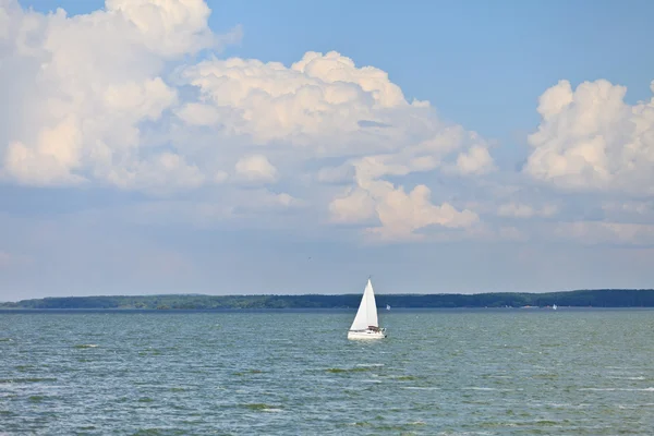 stock image White yacht in blue sea