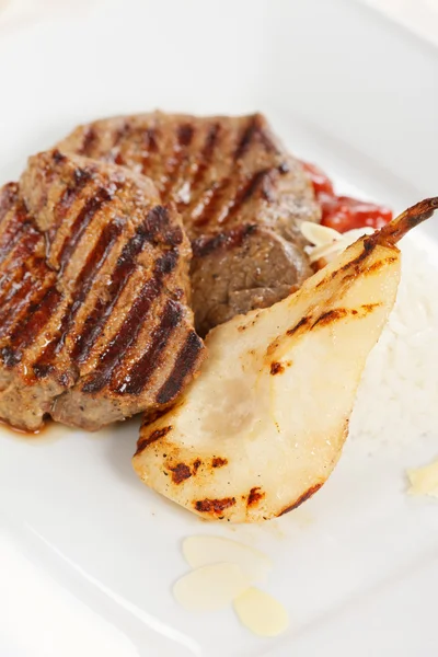 Grilled pork steak with pear — Stock Photo, Image