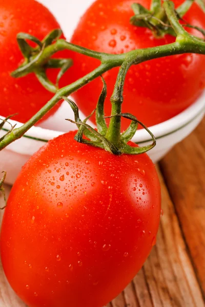Tomatoes on the plate Royalty Free Stock Images