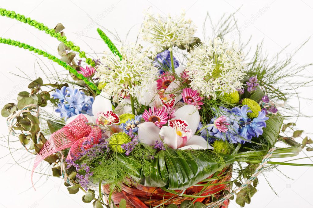 depositphotos_6984185-stock-photo-beautiful-flowers-in-the-basket.jpg