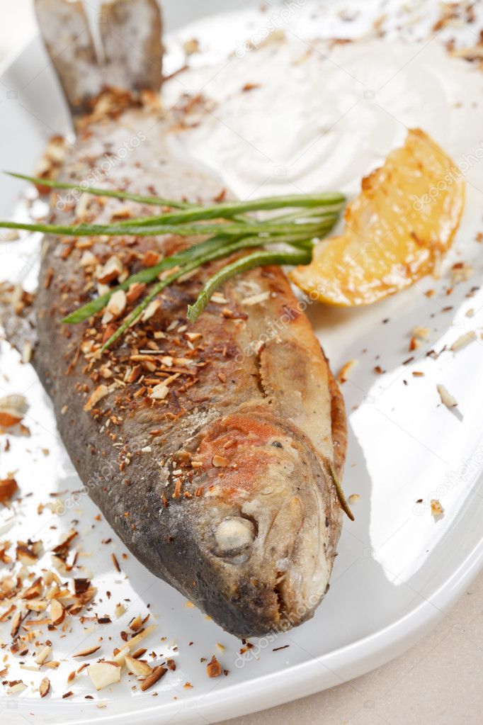 Trout fish baked with nuts