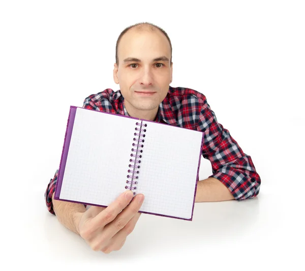 Muž zobrazeno notepad — Stock fotografie