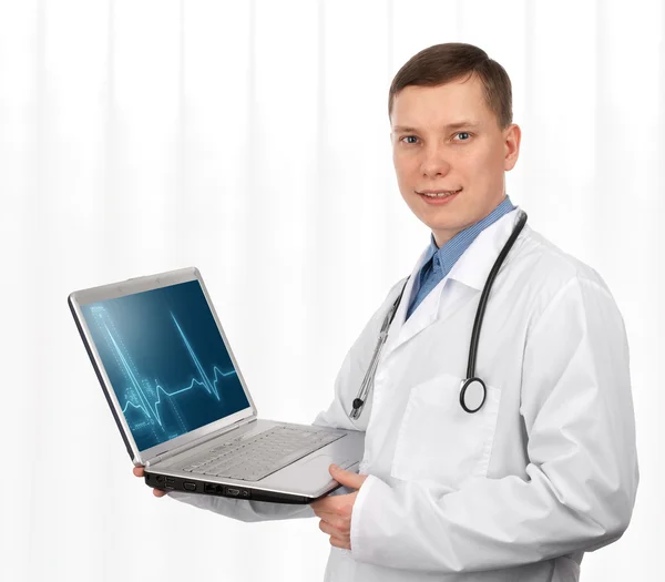 Doutor segurando seu laptop — Fotografia de Stock