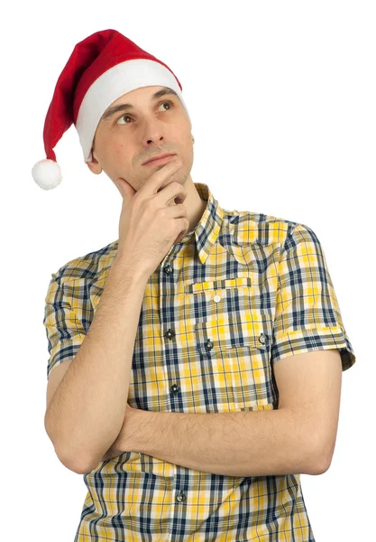 Young man in Christmas hat — Stok fotoğraf