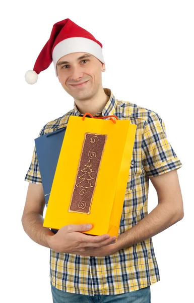 Hombre sosteniendo bolsas de compras de regalos de Navidad — Foto de Stock