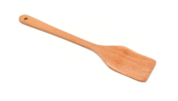 Beyaz arkaplanda ahşap bir spatula — Stok fotoğraf