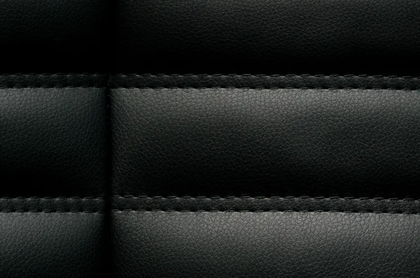 Textur av svart läder — Stockfoto