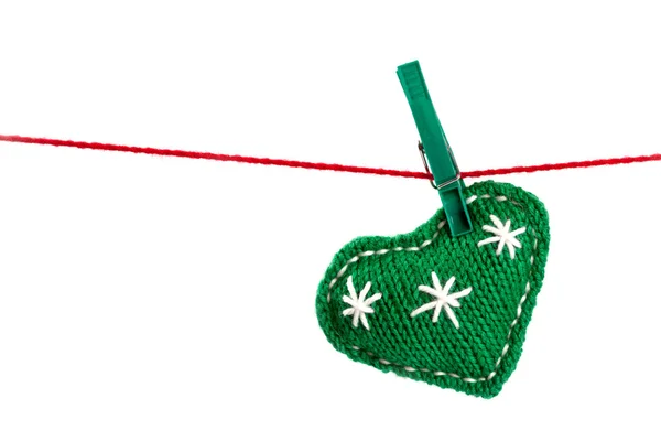 Single knitted green heart — ストック写真