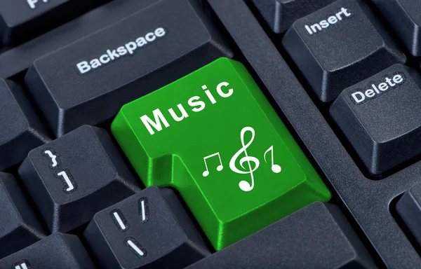 Кнопка клавиатуры с скрипичным ключом и нотами . — стоковое фото