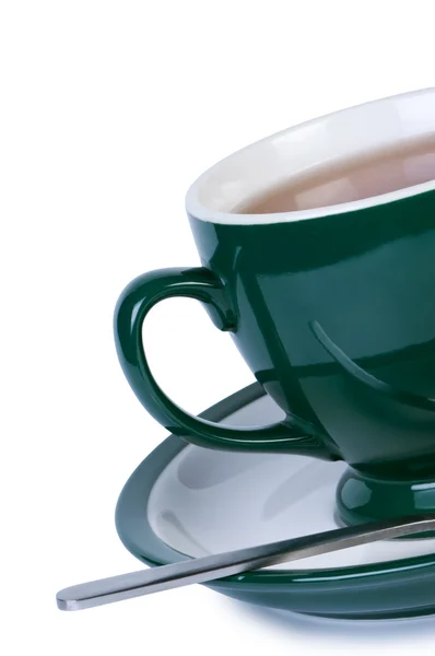 Tasse Tee auf Untertasse mit Löffel isoliert. — Stockfoto