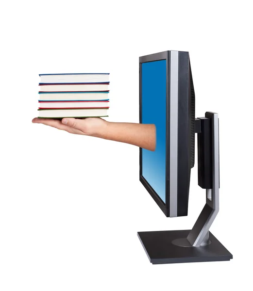 Computer screen and hand with books. — Stock Photo, Image
