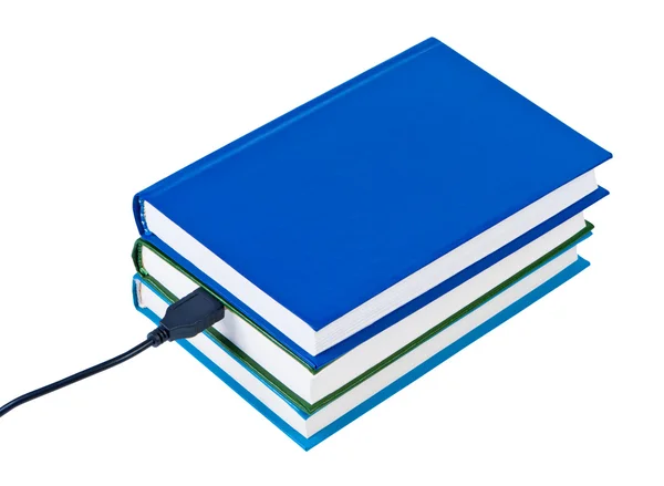 Livros fio conectado USB isolado no fundo branco . — Fotografia de Stock
