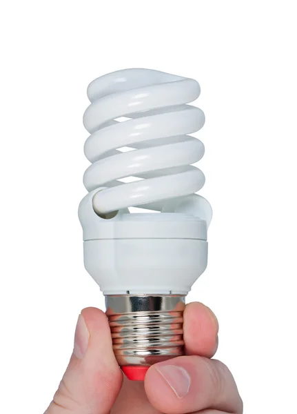 Δάχτυλα κρατώντας ηλεκτρικό λαμπτήρα εξοικονόμησης ενέργειας που απομονώνονται σε λευκό. — Φωτογραφία Αρχείου