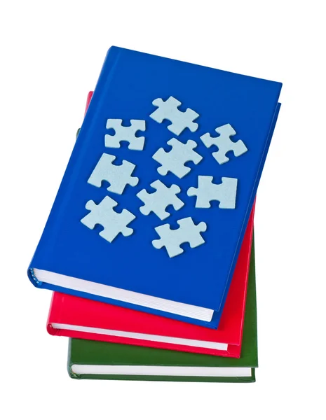 Bücher mit Rätseln isoliert auf weißem Hintergrund. — Stockfoto