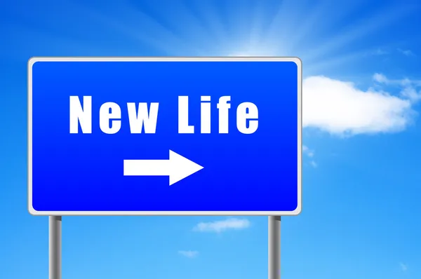 New life road sign with arrow on sky background. — Stock Photo, Image
