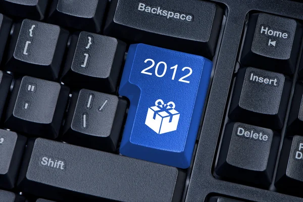 Button computer keyboard with icon gift and figures 2012. — Stock Photo, Image