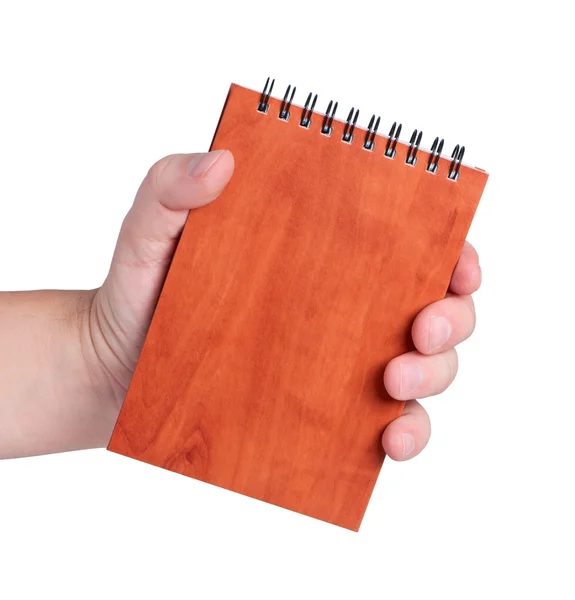 Männerhand hält ein Notizbuch isoliert auf weißem Hintergrund. — Stockfoto