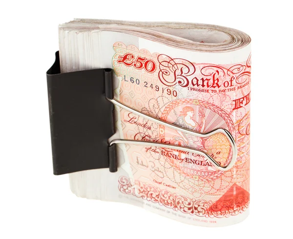 Bundle of 50 pound sterling bank notes fasten with paper clip, i — Stock Photo, Image