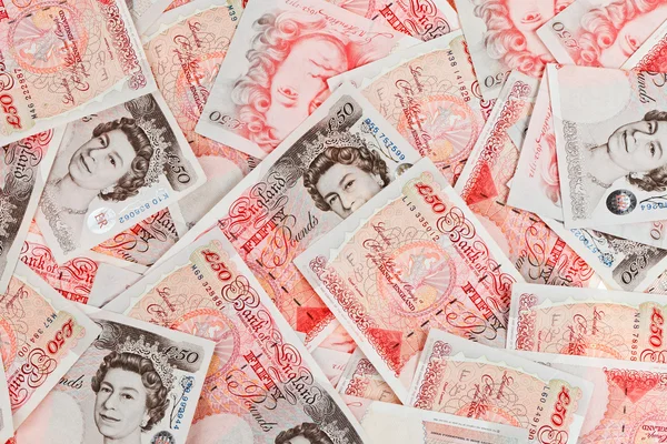 50 pund sterling sedlar närbild visa affärs bakgrund — Stockfoto