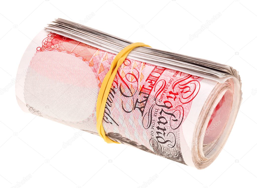 Pound sterling rolled up bank notes, isolated on white