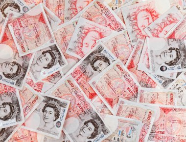 50 pound sterling bank notes closeup view business background clipart