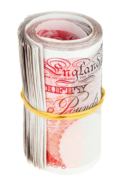 Pfund Sterling zusammengerollte Banknoten, isoliert auf weiß — Stockfoto