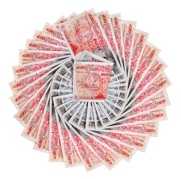 Muitas notas de banco de 50 libras esterlinas espalhadas, isoladas em branco — Fotografia de Stock
