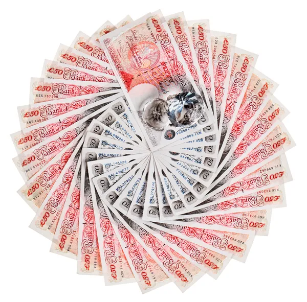 Muchos billetes de 50 libras esterlinas con diamantes desplegados, isol — Foto de Stock