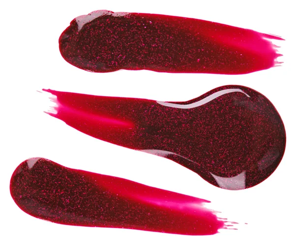 Krople czerwony lakier do paznokci (Emalia) próbki, na białym tle — Zdjęcie stockowe