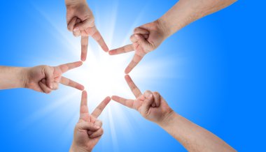 Hands in the form of a star clipart