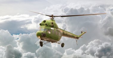 Helicopter MI-2 flight, Russia against clouds clipart