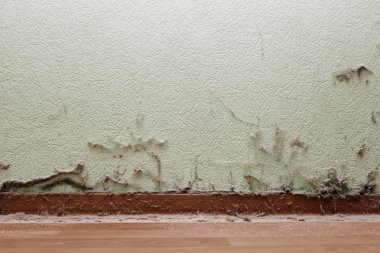 Dirty room with dust on wall and floor clipart