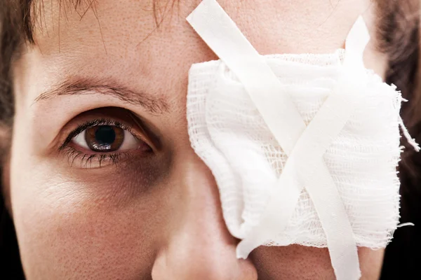 Plaster patch on wound eye — Stock Photo, Image
