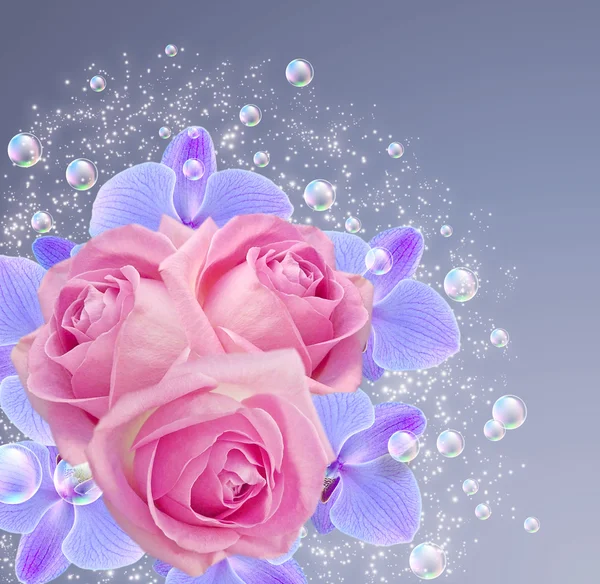 Орхидея, розы и пузырьки — стоковое фото