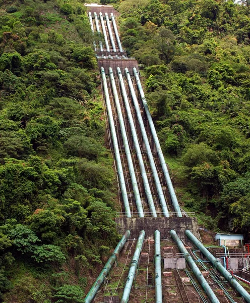 Large Penstock Pipes on a Mountain Slope — Stock Photo, Image